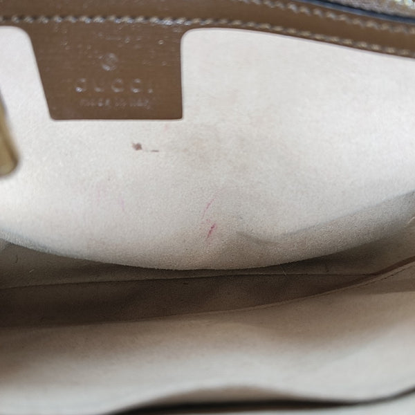 Authenticated pre-owned Jackie 1961 Small Monogram Coated Canvas Beige - Top Handle Bag at Looply