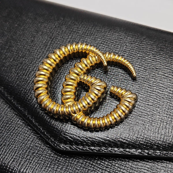 Authenticated pre-owned GG Marmont Calfskin Black - Clutch at Looply