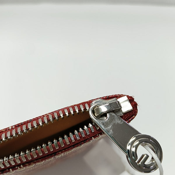 Authenticated pre-owned Sénat Small Coated Canvas Red - Clutch at Looply