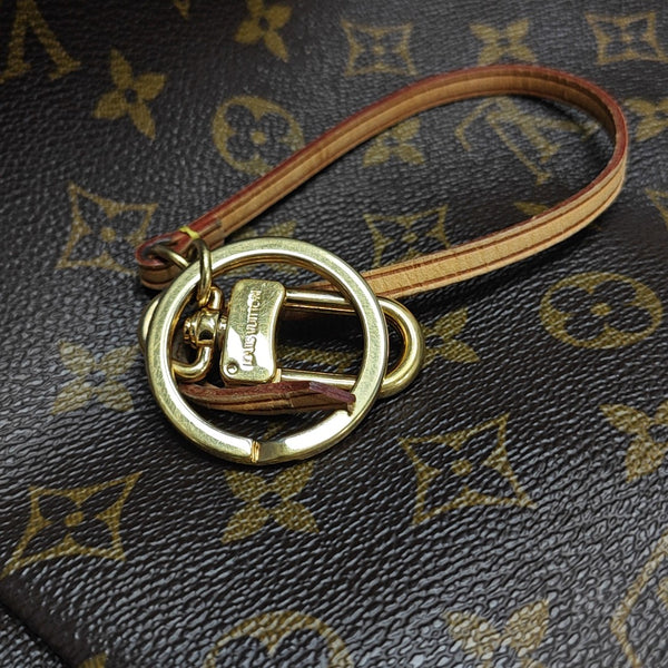 Authenticated pre-owned Artsy MM Monogram Coated Canvas Brown - Top Handle Bag at Looply