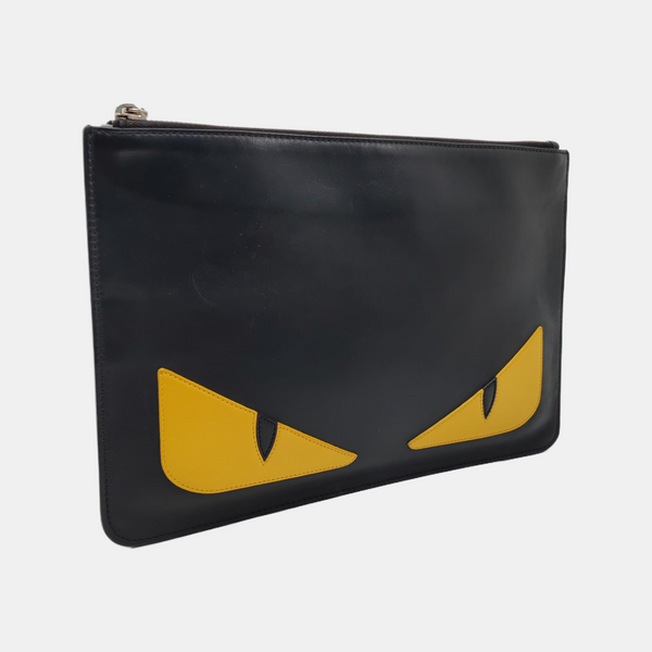 Authenticated pre-owned Monster Calfskin Black - Clutch at Looply