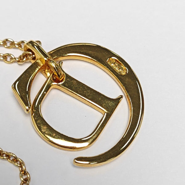 Authenticated pre-owned CD Swing Gold Tone Metal Gold Necklace - Necklace at Looply