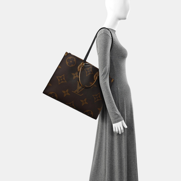 Authenticated pre-owned Onthego GM Monogram Coated Canvas Brown - Top Handle Bag at Looply