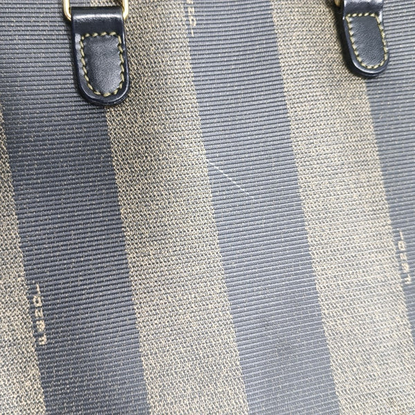 Bolso de hombro de lona revestida marrón
