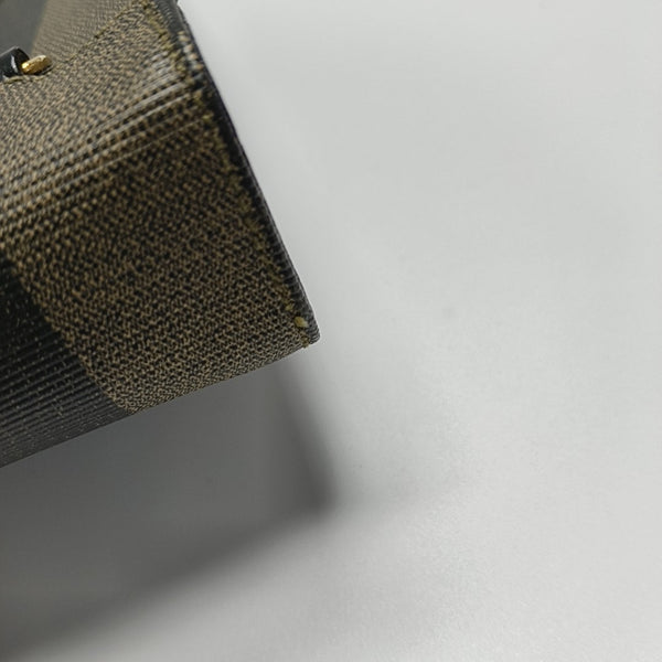 Bolso de hombro de lona revestida marrón