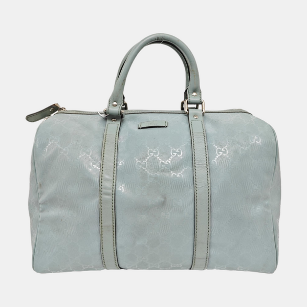 Authenticated pre-owned Joy Medium Monogram Coated Canvas Blue - Top Handle Bag at Looply