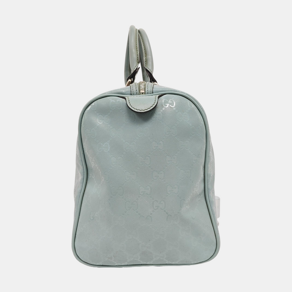 Authenticated pre-owned Joy Medium Monogram Coated Canvas Blue - Top Handle Bag at Looply