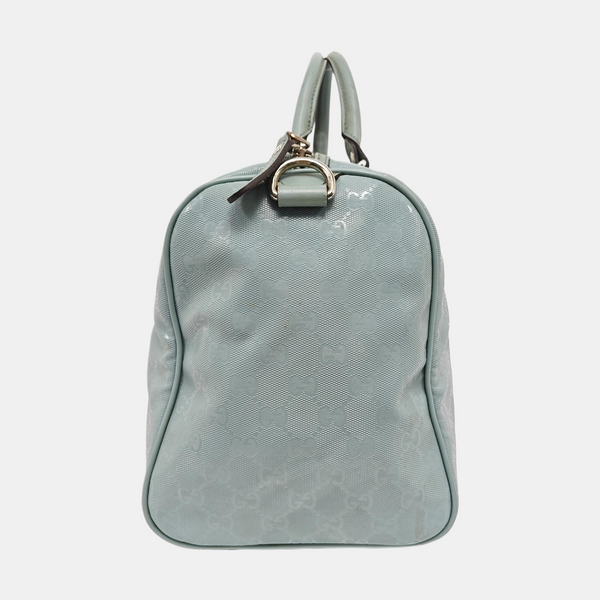 Authenticated pre-owned Joy Medium Monogram Coated Canvas Blue - Top Handle Bag at Looply