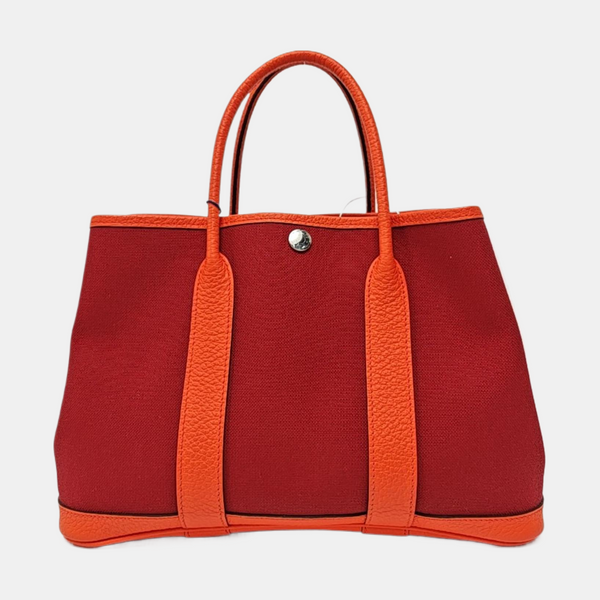 Authenticated pre-owned Garden Party Canvas Burgundy - Top Handle Bag at Looply
