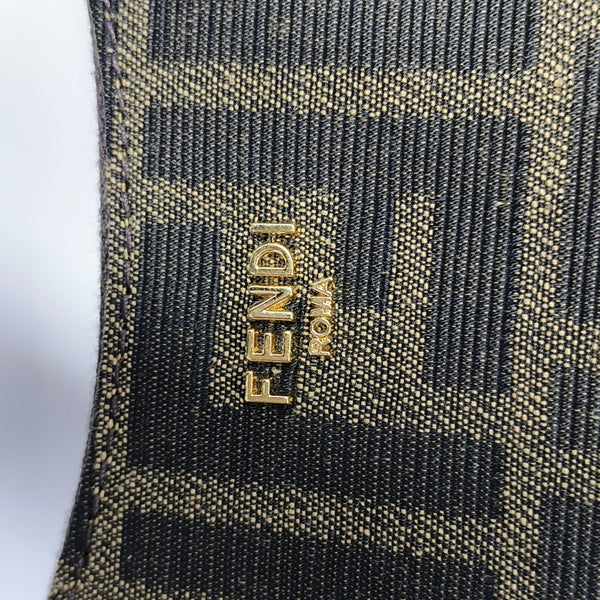 Bolso de mano de tela marrón