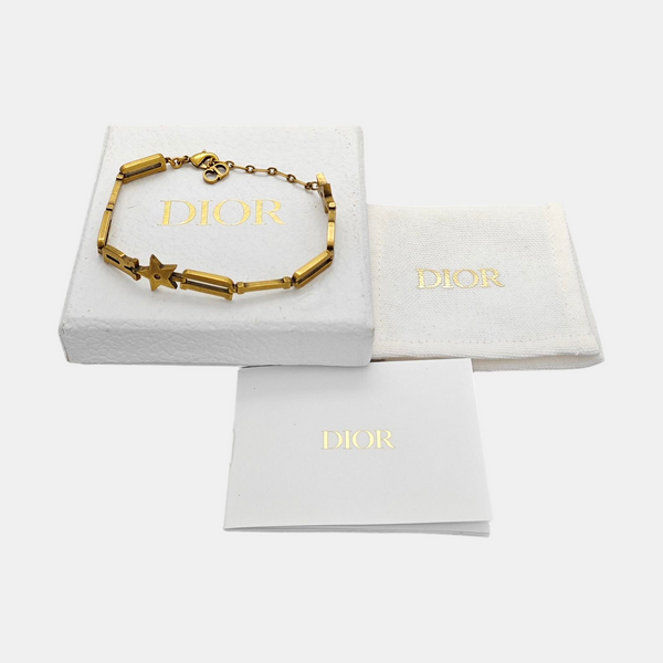 Authenticated pre-owned J'ADIOR Logo Gold-Tone Metal Bracelet - Bracelet at Looply