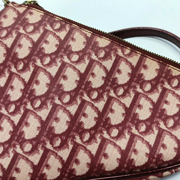 Authenticated pre-owned Saddle Oblique Canvas Red - Top Handle Bag at Looply