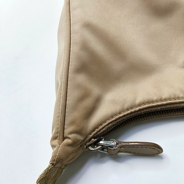Authenticated pre-owned Re-edition2000 Mini Nylon Beige - Top Handle Bag at Looply