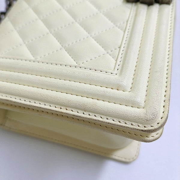 Authenticated pre-owned Boy Chanel Medium Quilted Lambskin White - Crossbody Bag at Looply