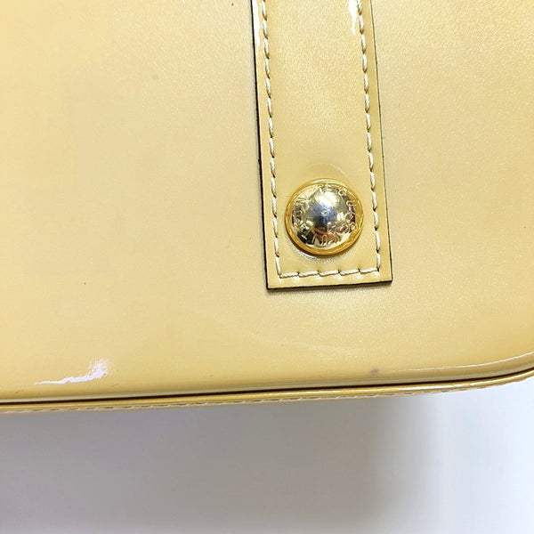 Authenticated pre-owned Alma PM Monogram Patent Leather Yellow - Top Handle Bag at Looply
