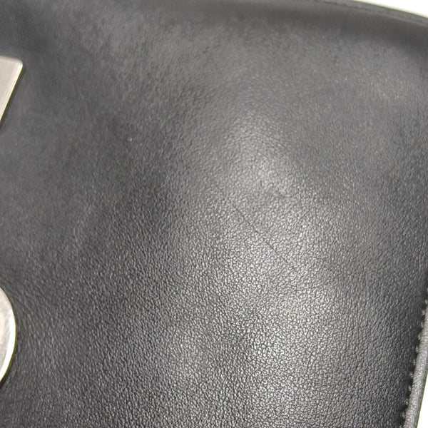Authenticated pre-owned Monster Calfskin Black - Clutch at Looply