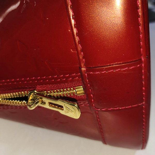 Authenticated pre-owned Alma GM Patent Leather Red - Top Handle Bag at Looply