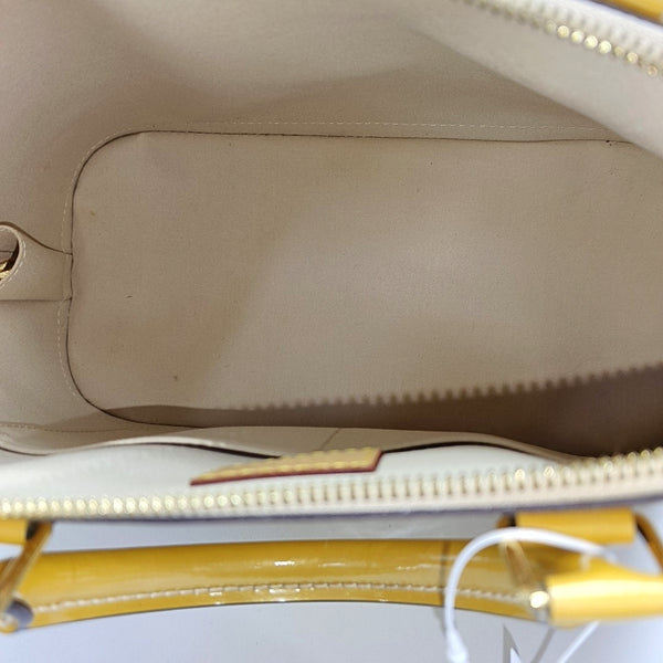 Authenticated pre-owned Alma PM Monogram Patent Leather Yellow - Top Handle Bag at Looply