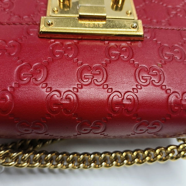 Authenticated pre-owned Padlock Small Monogram Calfskin Red - Shoulder Bag at Looply