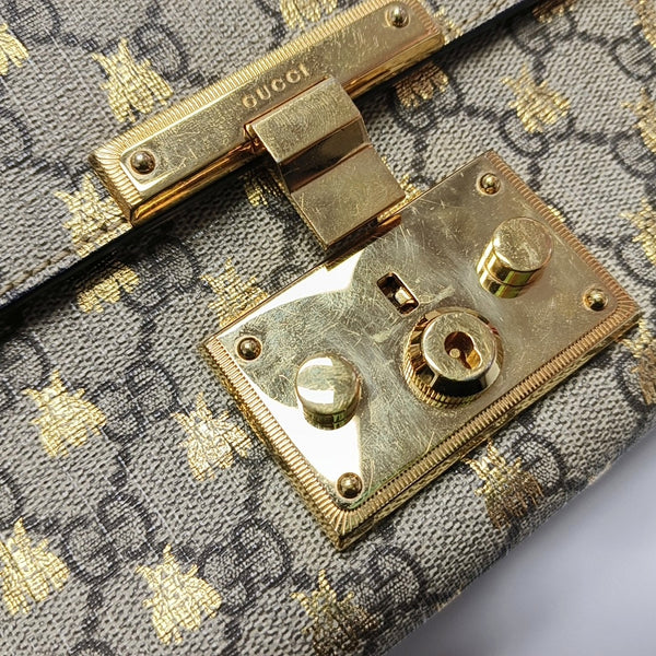 Authenticated pre-owned Padlock Small Monogram Coated Canvas Beige - Shoulder Bag at Looply