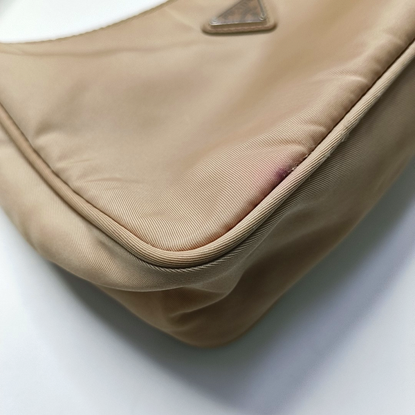 Authenticated pre-owned Re-edition2000 Mini Nylon Beige - Top Handle Bag at Looply