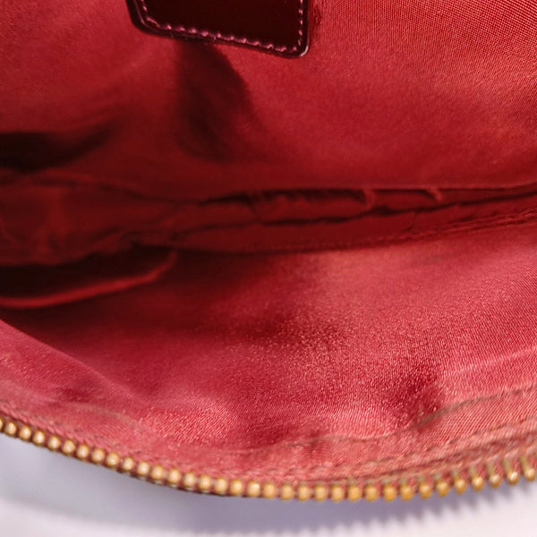Authenticated pre-owned Saddle Oblique Canvas Red - Top Handle Bag at Looply