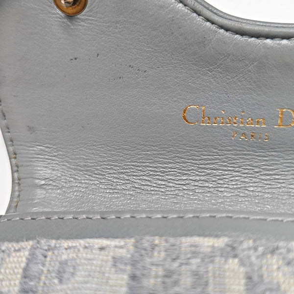 Authenticated pre-owned Saddle Oblique Canvas Gray Card Holder - Card Holder at Looply