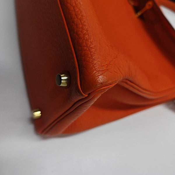 Authenticated pre-owned Kelly 35 Togo Orange - Shoulder Bag at Looply