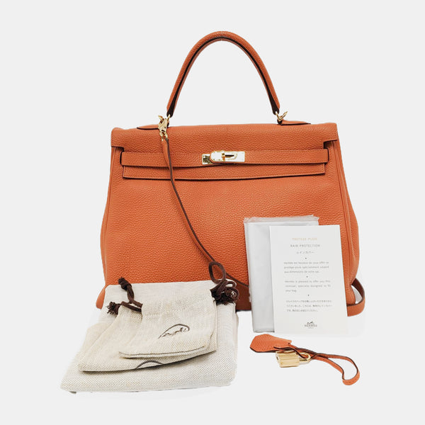Authenticated pre-owned Kelly 35 Togo Orange - Shoulder Bag at Looply