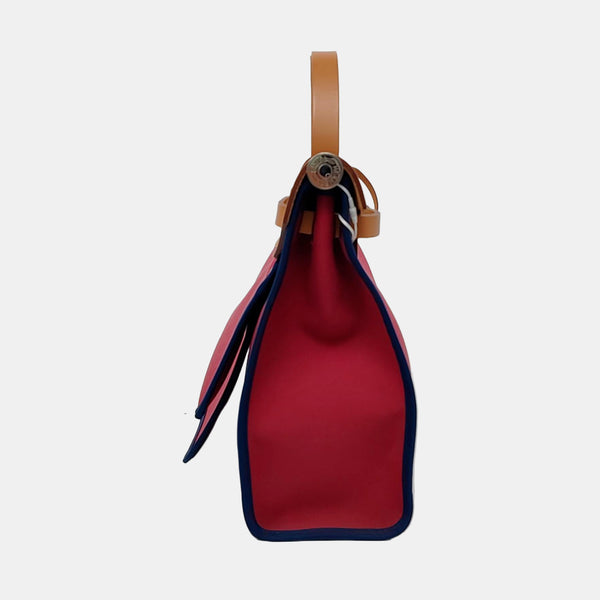 Authenticated pre-owned Herbag 31 Canvas Red - Top Handle Bag at Looply