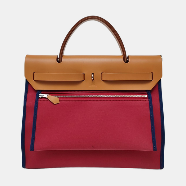 Authenticated pre-owned Herbag 31 Canvas Red - Top Handle Bag at Looply