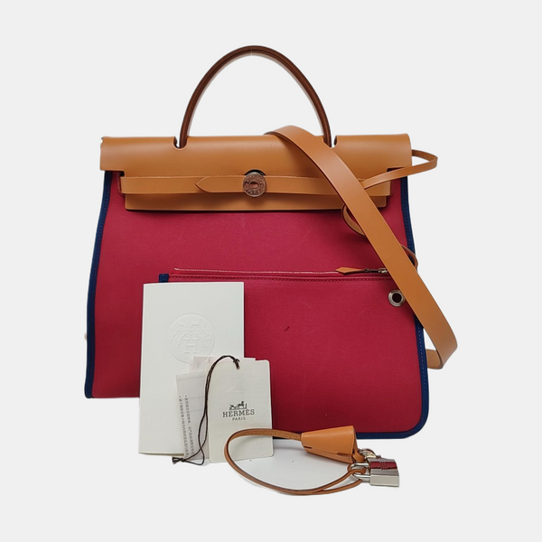 Authenticated pre-owned Herbag 31 Canvas Red - Top Handle Bag at Looply