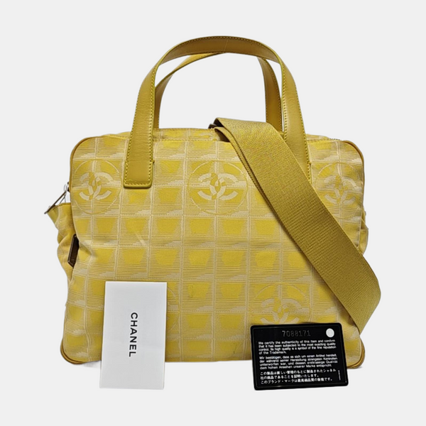 Authenticated pre-owned Chanel Travel Line Fabric Yellow - Shoulder Bag at Looply