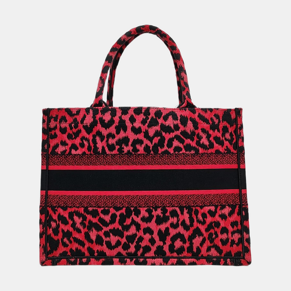 Authenticated pre-owned Book Tote Medium Fabric Red - Top Handle Bag at Looply