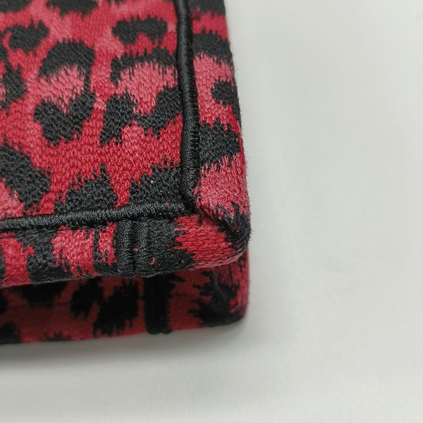 Authenticated pre-owned Book Tote Medium Fabric Red - Top Handle Bag at Looply