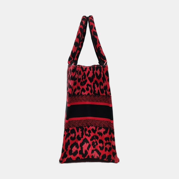 Authenticated pre-owned Book Tote Medium Fabric Red - Top Handle Bag at Looply