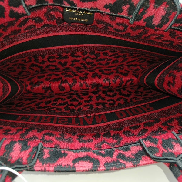 Authenticated pre-owned Book Tote Medium Fabric Red - Top Handle Bag at Looply