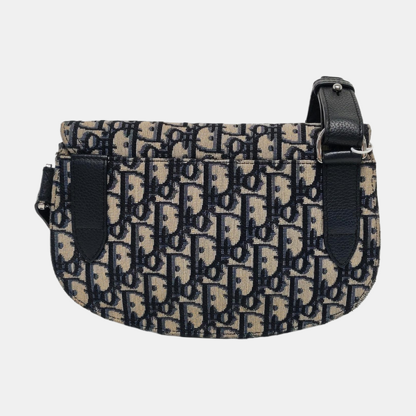 Authenticated pre-owned Saddle Monogram Canvas Beige - Crossbody Bag at Looply