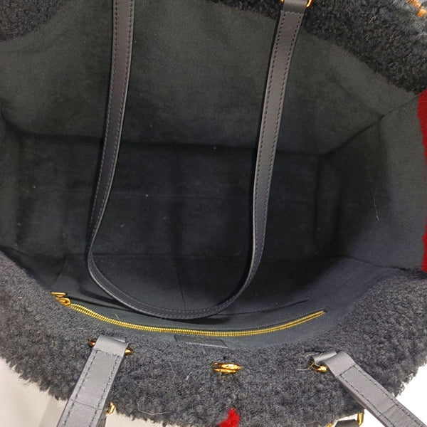 Authenticated pre-owned Onthego GM Monogram Wool Black - Shoulder Bag at Looply