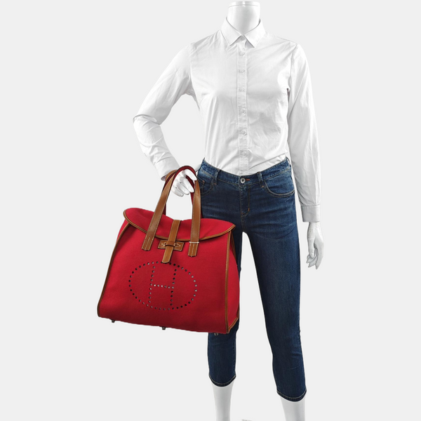 Authenticated pre-owned Evelyne 38 Felt Red - Top Handle Bag at Looply