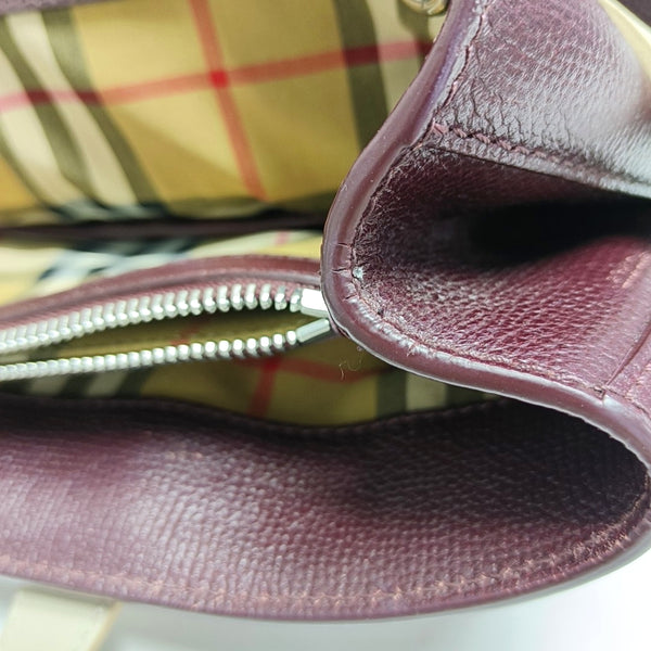 Authenticated pre-owned The Banner Medium Calfskin Burgundy - Top Handle Bag at Looply