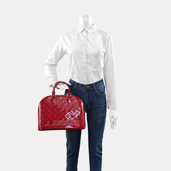 Authenticated pre-owned Alma PM Monogram Patent Leather Red - Top Handle Bag at Looply