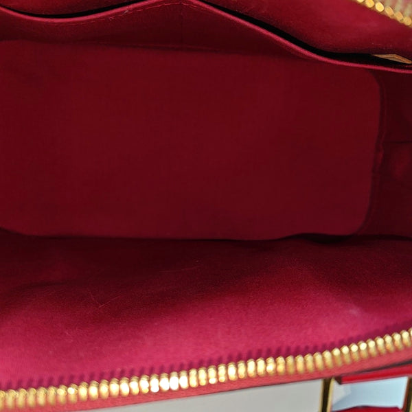 Authenticated pre-owned Alma PM Monogram Patent Leather Red - Top Handle Bag at Looply
