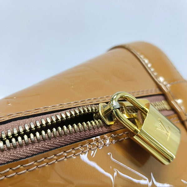Authenticated pre-owned Alma PM Patent Leather Beige - Top Handle Bag at Looply