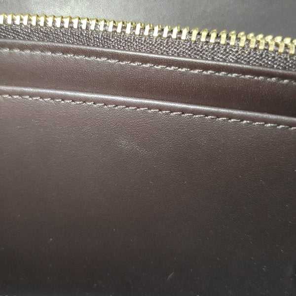 Authenticated pre-owned LV × TM Sarah Patent Leather Burgundy - Clutch at Looply