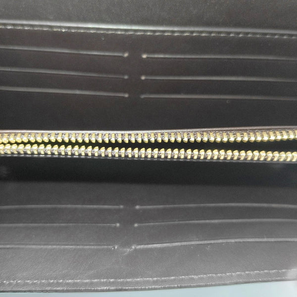 Authenticated pre-owned LV × TM Sarah Patent Leather Burgundy - Clutch at Looply