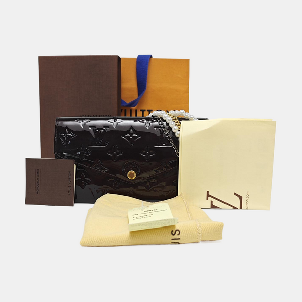 Authenticated pre-owned LV × TM Sarah Patent Leather Burgundy - Clutch at Looply