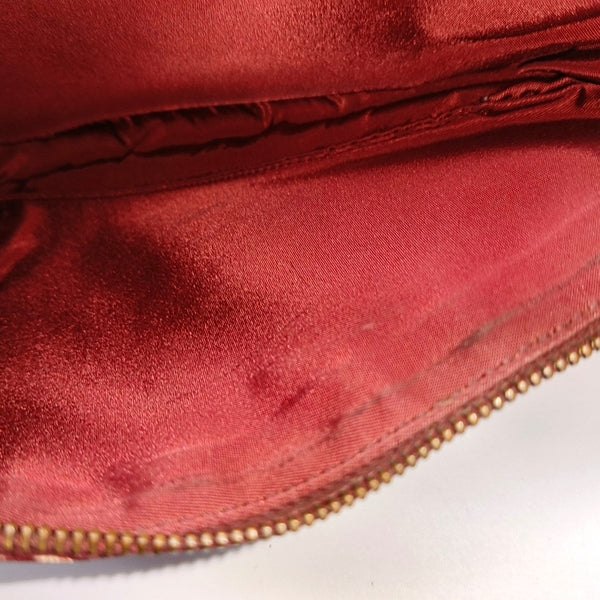 Authenticated pre-owned Saddle Oblique Canvas Red - Top Handle Bag at Looply
