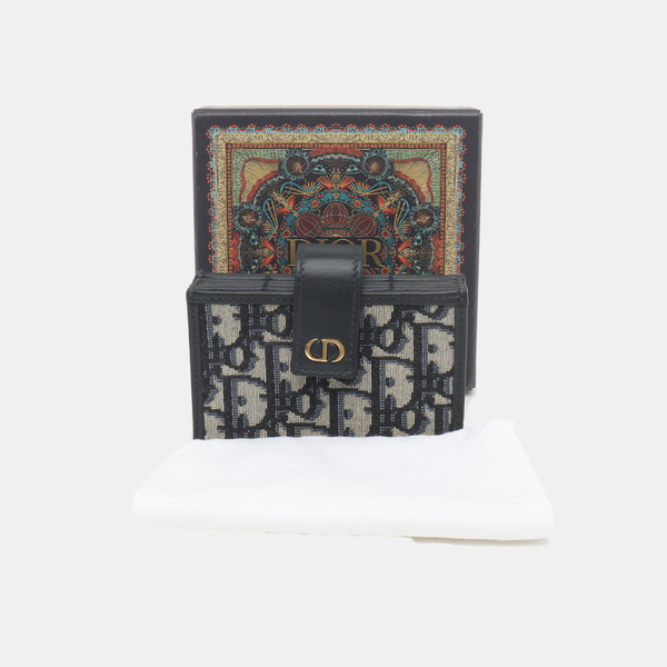 Authenticated pre-owned 30 Montaigne Canvas Blue Card Holder - Card Holder at Looply