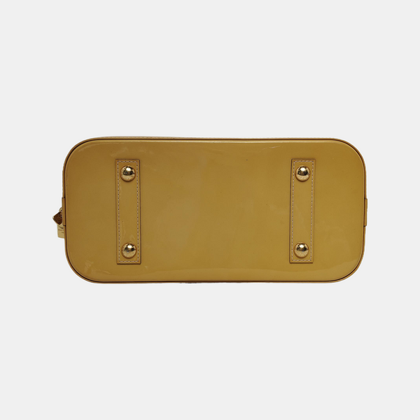 Authenticated pre-owned Alma PM Patent Leather Yellow - Top Handle Bag at Looply